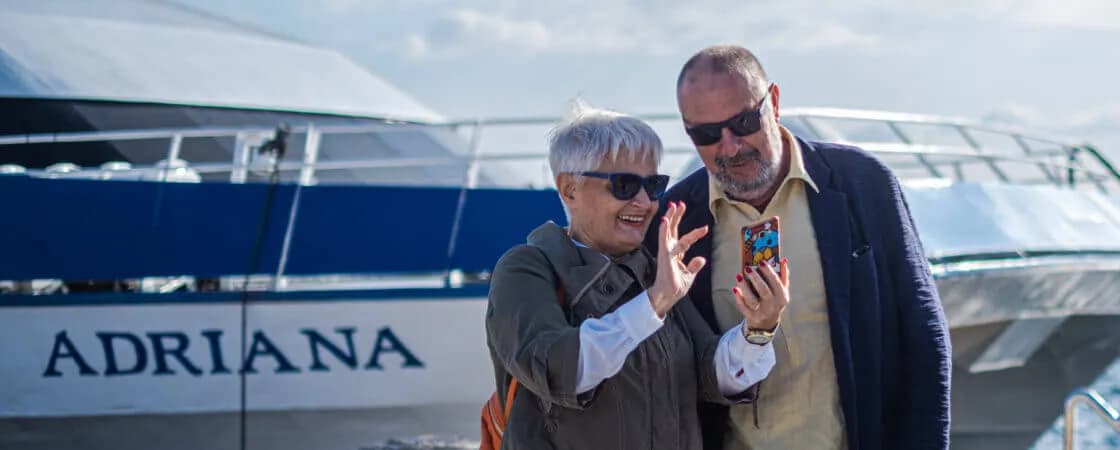 Official Jadrolinija photo of passengers checking ferry information in front of a ferry for the 26 April Split to Vis update