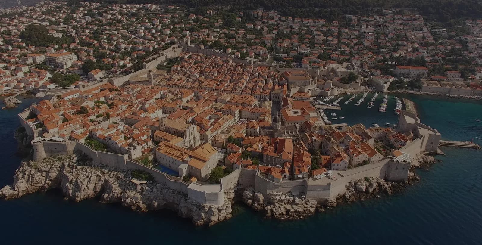 Dubrovnik Old Town walls and harbor seen from above
