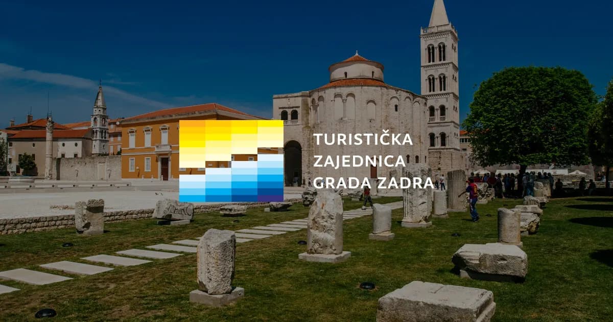 View of Zadar's Roman Forum with the Church of St. Donatus and its bell tower behind it under a clear blue sky